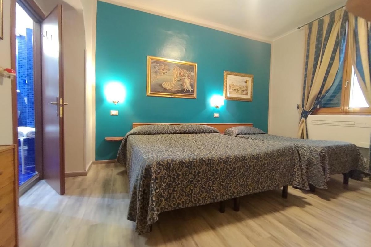 Chambre triple de l'Hotel Santa Croce à Florence